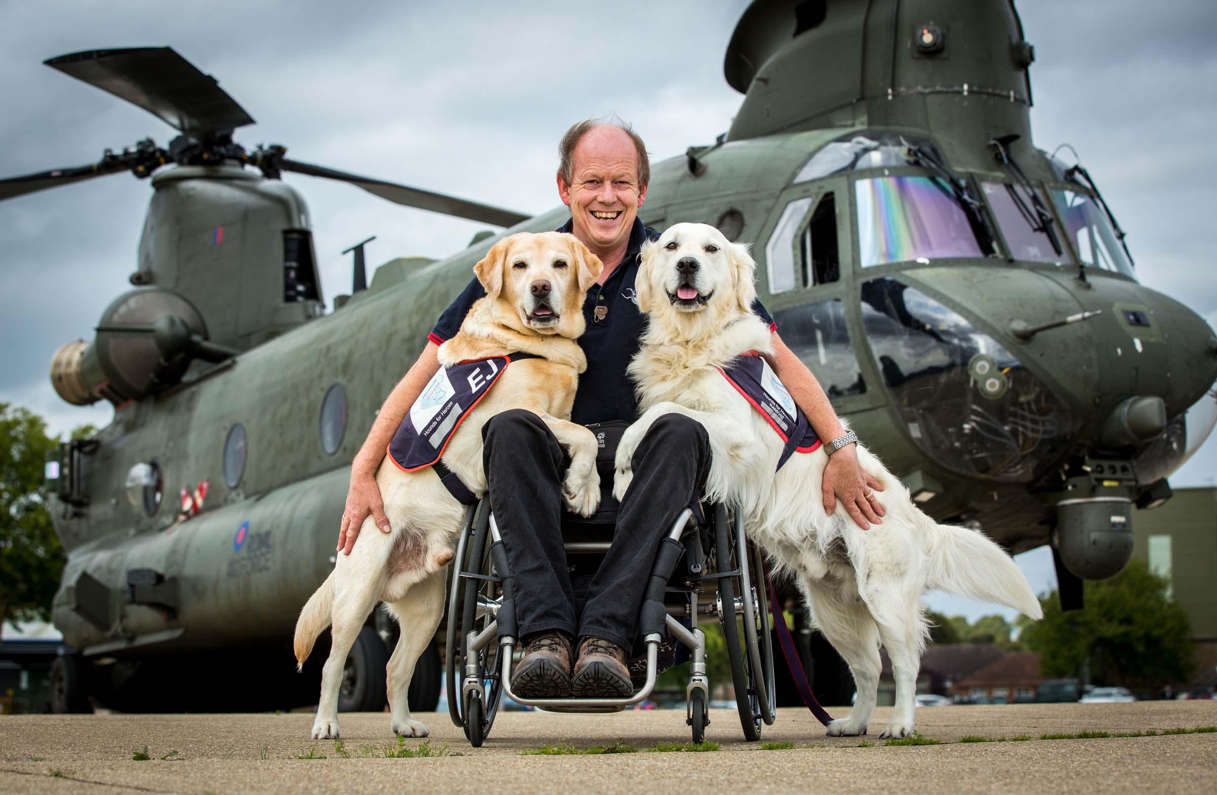 Hounds For Heroes Founder, Allen Patron, his wife and 3 of their dogs visited RAF Odiham to talk to RAF Odiham personnel about Hounds For Heroes.Allen also went to visit 18 Squadron and get photographs on the ramp of a Chinook and on the pan in front of a Chinook, with the dogs that he brought with him.Image Credit: SAC Pippa FowlesFor further information please contact: SAC Pippa Fowles, Ground Photographic Section, RAF Odiham, Odiham, RG29 1QTTel: 01256 367289 / 01256 367946MoD Consent Form (2012DIN05-006 Annex A) held by SAC Philippa Fowles, RAF Odiham, Odiham